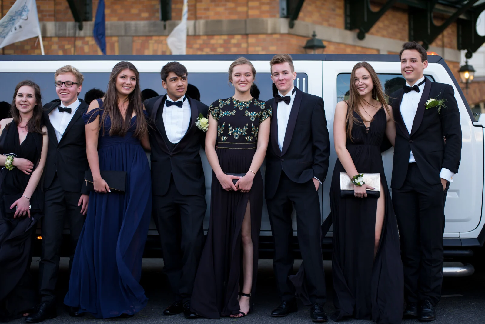 Couples Posing Outside a Prom After Party
